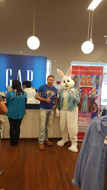 Alt: Easter Bunny rental appearance at Dolphin Mall in Doral Florida with Miami Superhero party entertainment banner