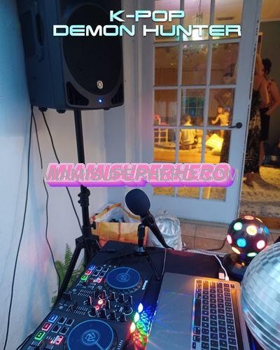 K-Pop Demon Hunter character with kids DJ lights in Fort Lauderdale
