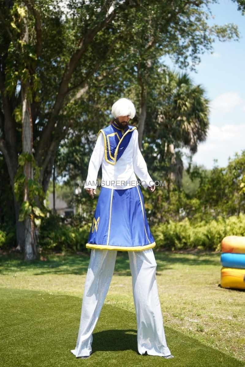 Kurapika cosplay character on stilts at a South Florida birthday
